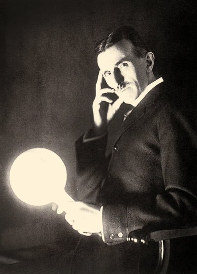 Portrait of Nikola Tesla Holding a Light Bulb Illuminated by the Electromagnetic Field of a Tesla Coil by Unbekannt Unbekannt